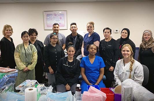 Carrington College Dental Assisting students at Phoenix refugee camp