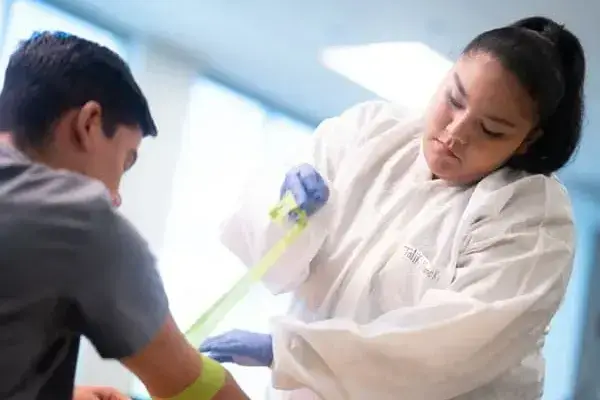Medical Assistant Student Working