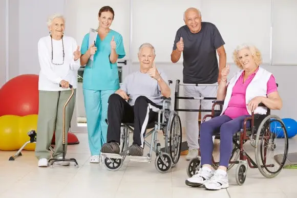 physical-therapy-aide-with-smiling-seniors