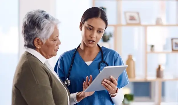 Nurse Holding Tablet